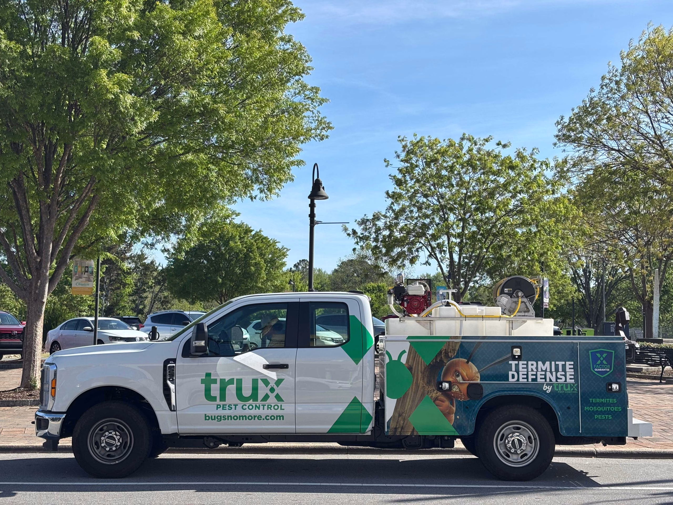 Termite Defense by TruX Pest Control Truck Wrap